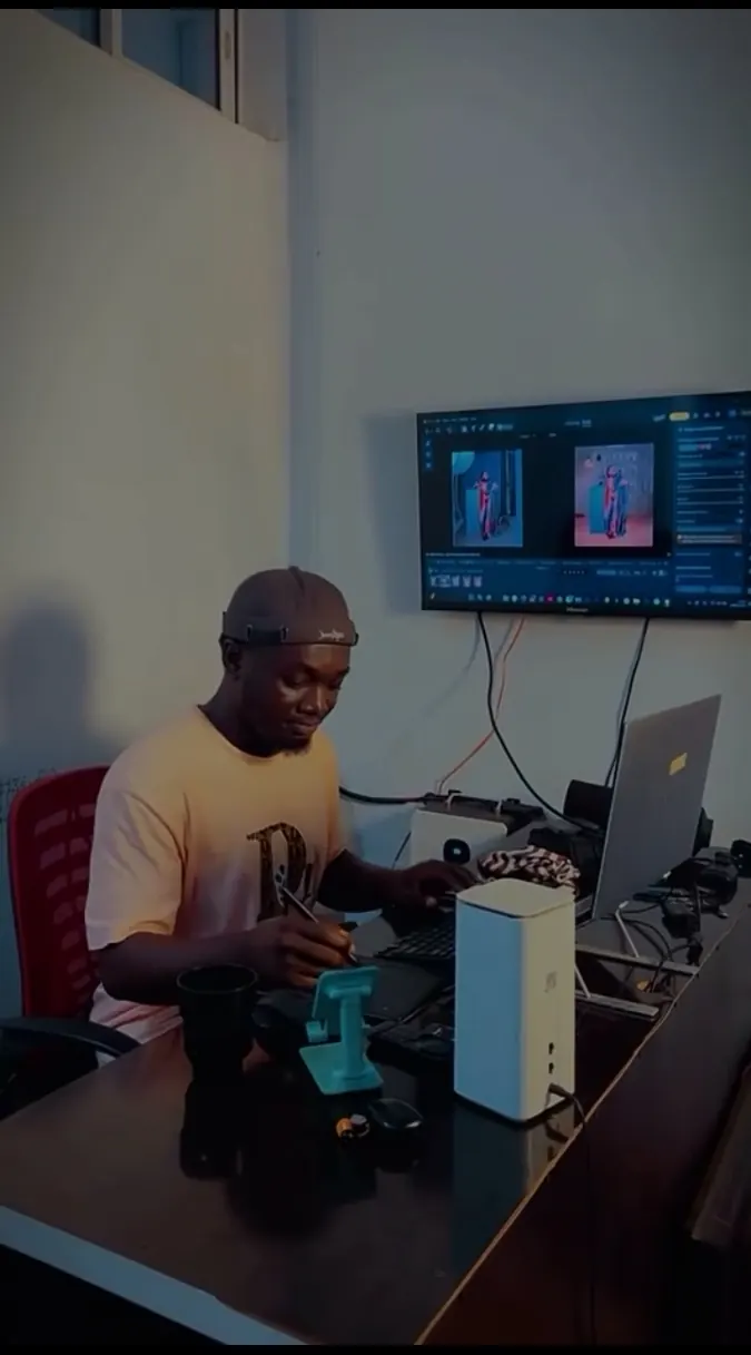 Ogunleke Victor David working at his editing desk